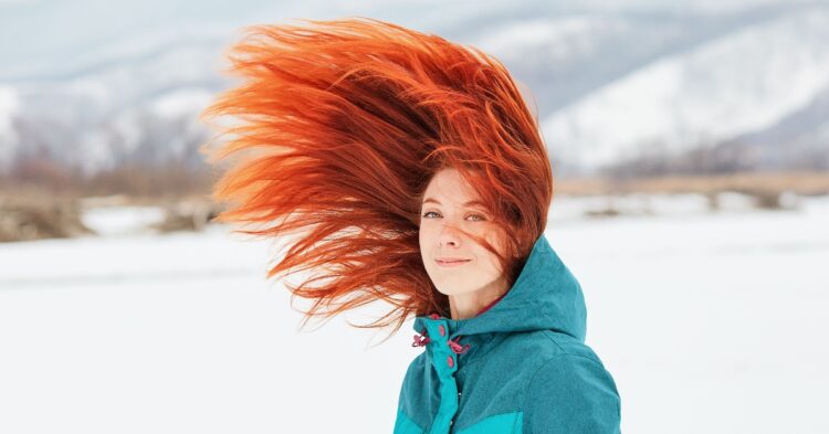 Red hair in the air (Unsplash | Tengyart)