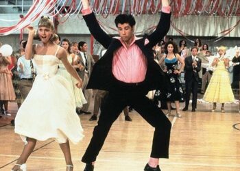Still from the movie musical 'Grease' with Sandy and Zuko dancing (Photo by Paramount Pictures)