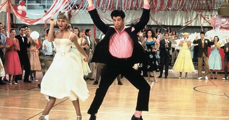 Still from the movie musical 'Grease' with Sandy and Zuko dancing (Photo by Paramount Pictures)