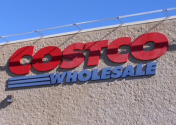 A picture of a Costco storefront with signage that says 