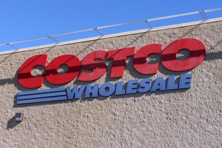 A picture of a Costco storefront with signage that says 