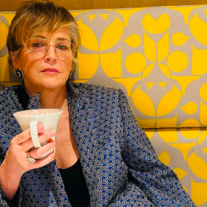 Sharon Stone holding a glass