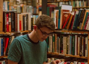 man reading book