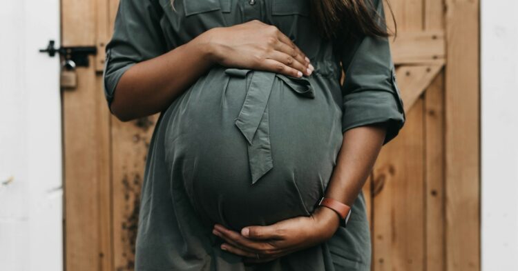 pregnant near door