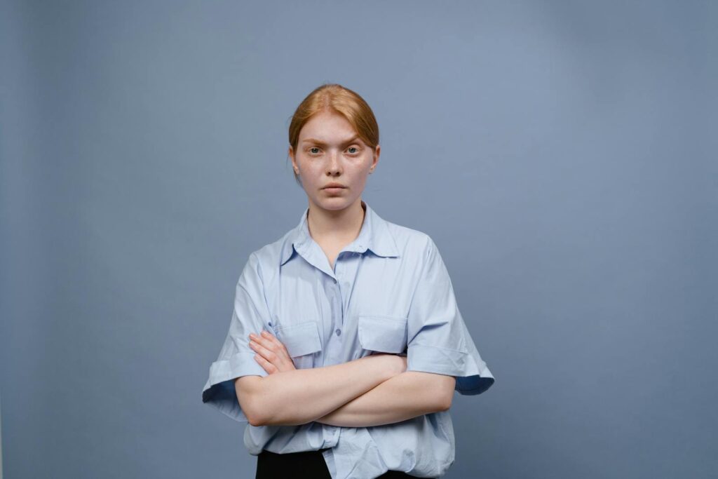 Woman in Blue Button Up Shirt