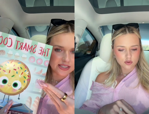 a woman holding a children’s book