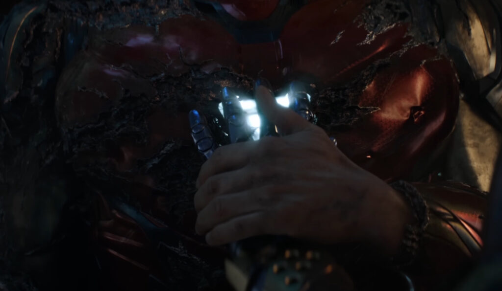 Pepper and Tony’s hands cover Tony’s Arc Reactor in Avengers: Endgame