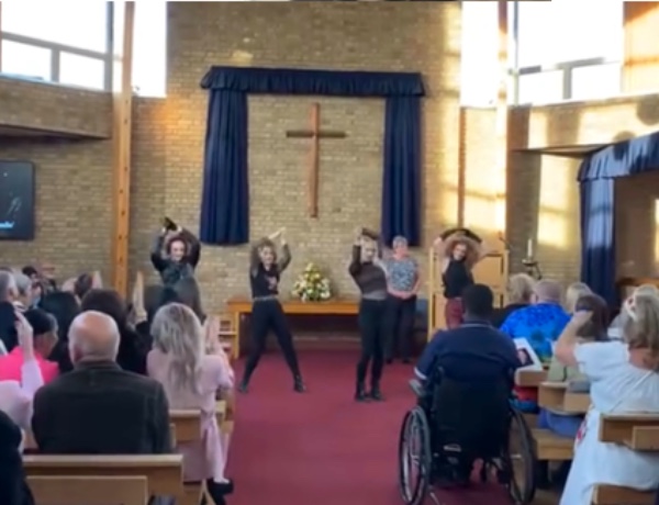 dancers performing at a funeral