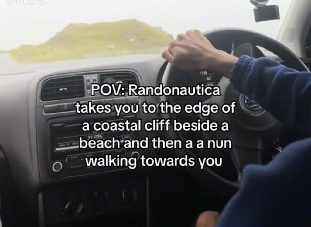 screenshot of a tiktok that says “POV: Randonautica takes you to the edge of a coastal cliff beside a beach and then a a nun walking towards you”
