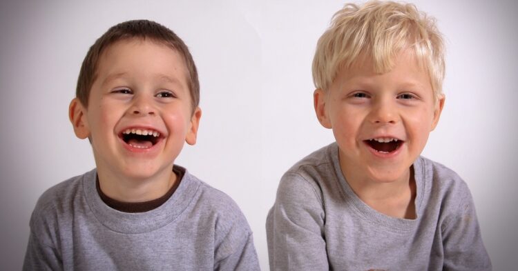 two boys laughing