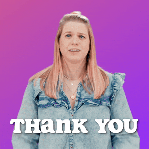 a gif of a girl making heart hands