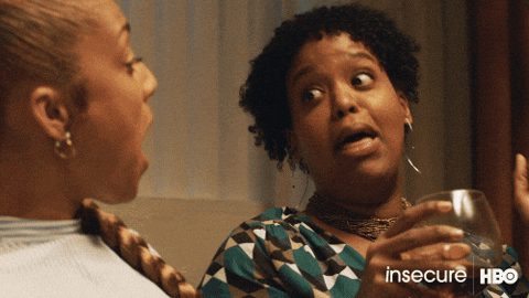 a gif of two people laughing