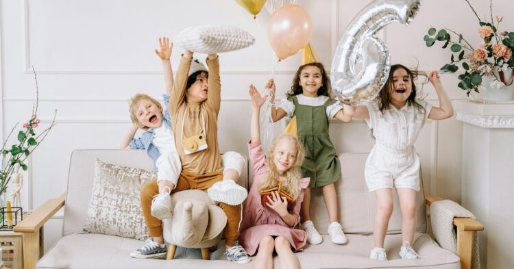 kids on a couch for a birthday party