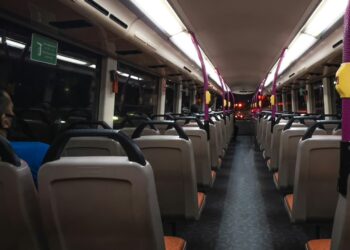 people sitting on bus seat