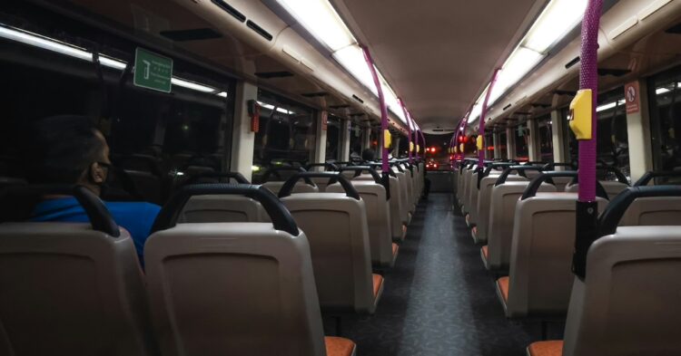 people sitting on bus seat