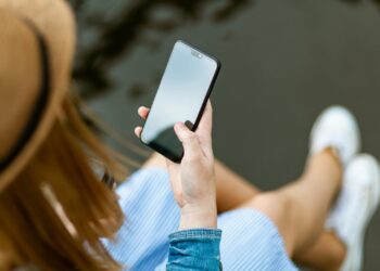Person Holding Smartphone White Sitting