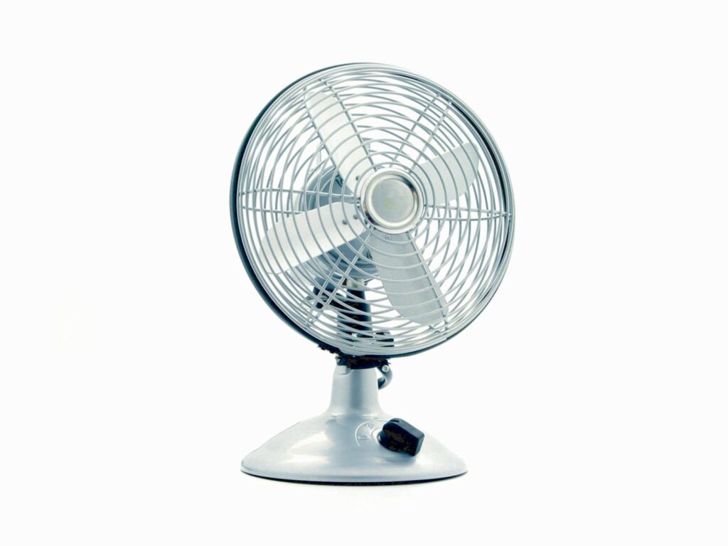 White Desk Fan on White Table