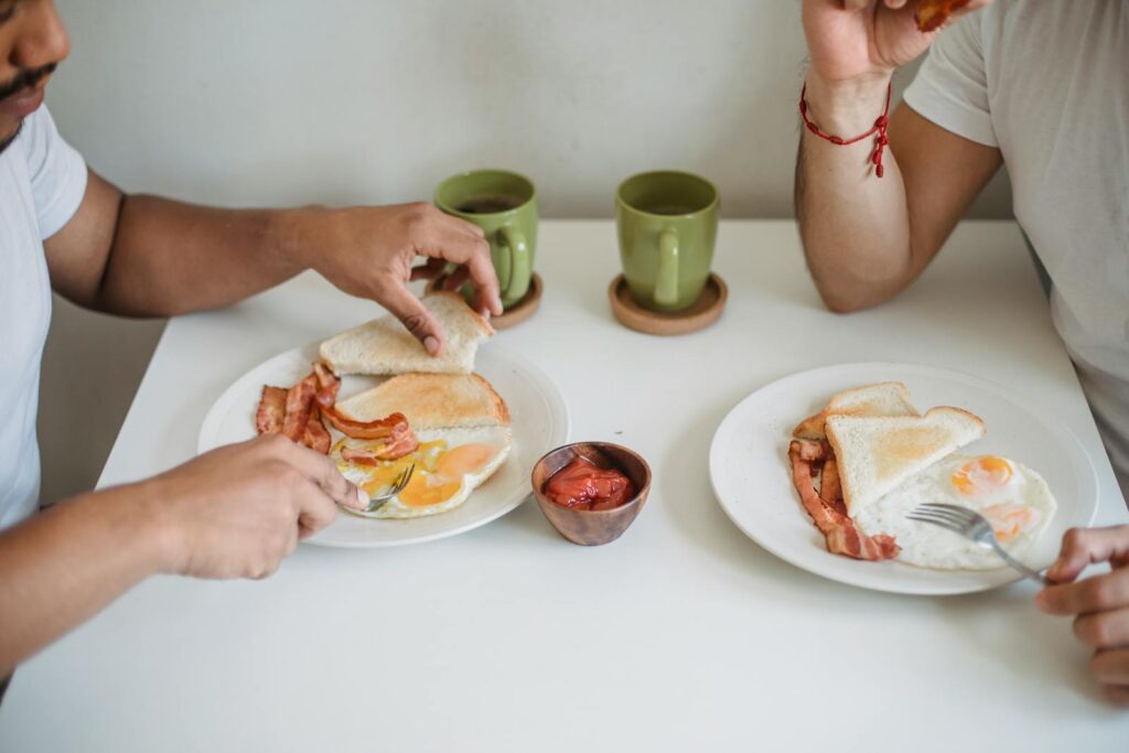 Plates with Breakfast on a Table