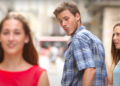 Distracted boyfriend stock photo via YouTube