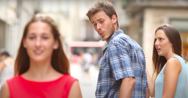 Distracted boyfriend stock photo via YouTube