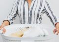 woman holding laundry basket