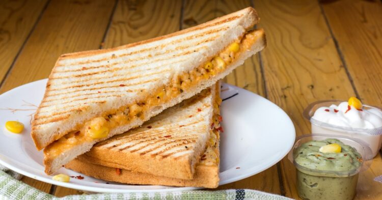 grilled cheese sandwich on a white plate