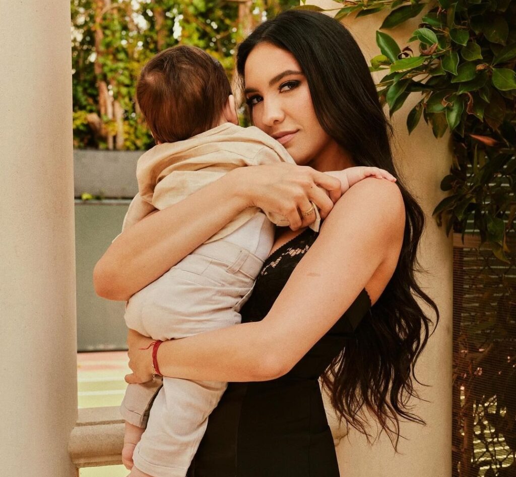 Noor Alfallah holding child