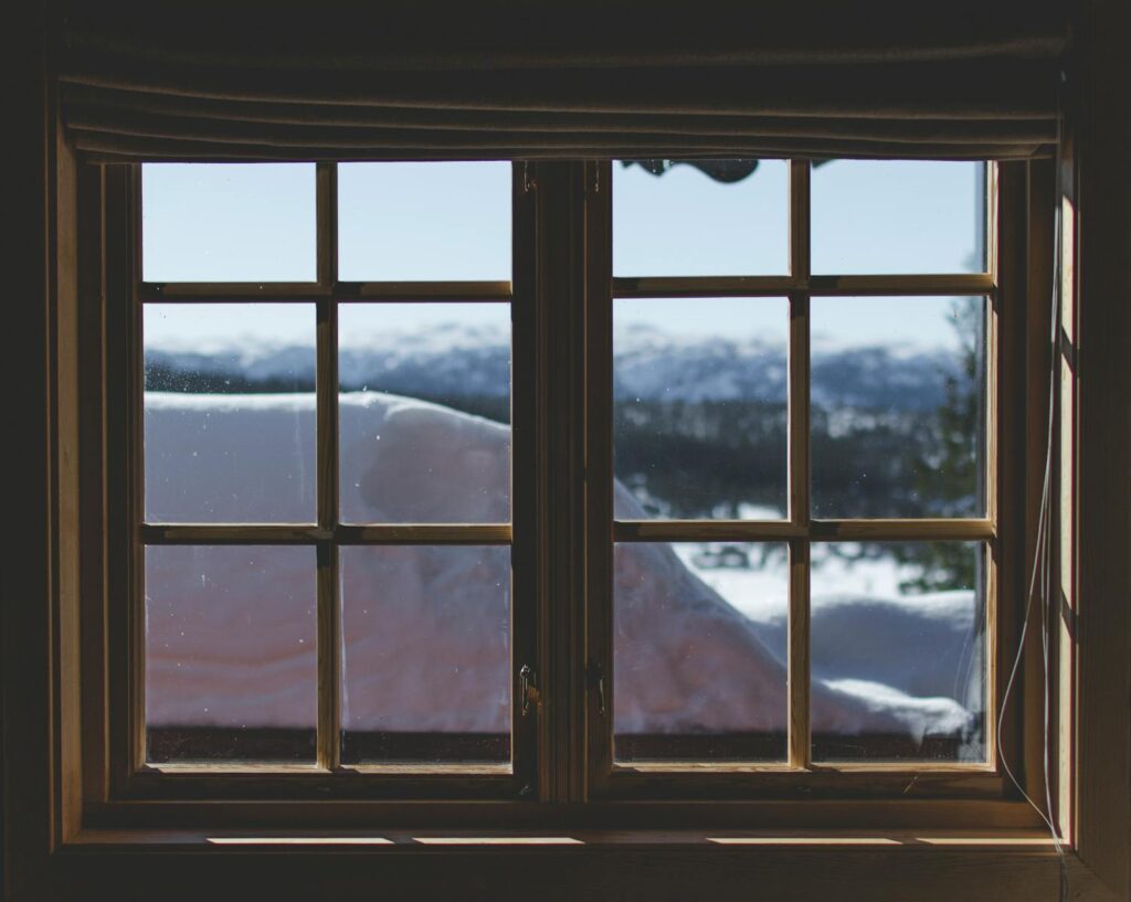 Two Brown Wooden Framed 6-lite Window Panes