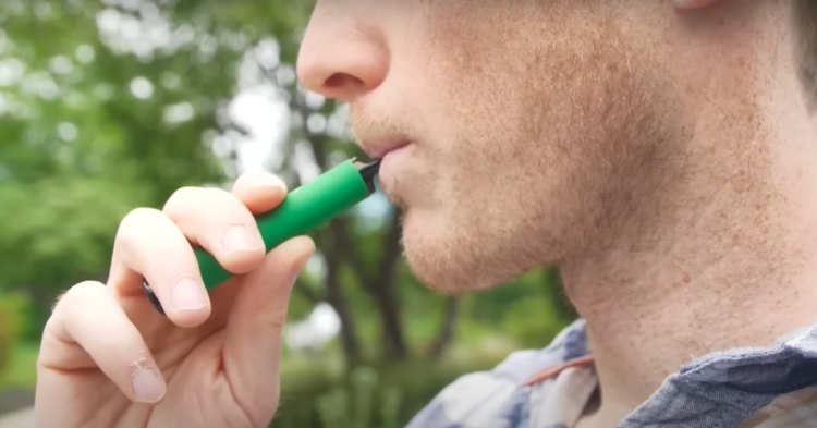 Man vaping via YouTube