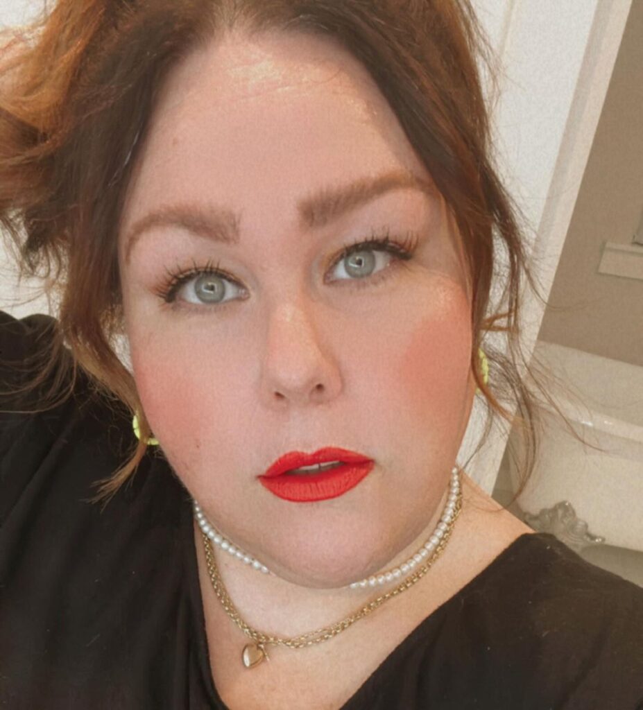 chrissy metz selfie with red lipstick