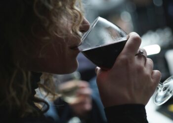 woman drinking glass of wine