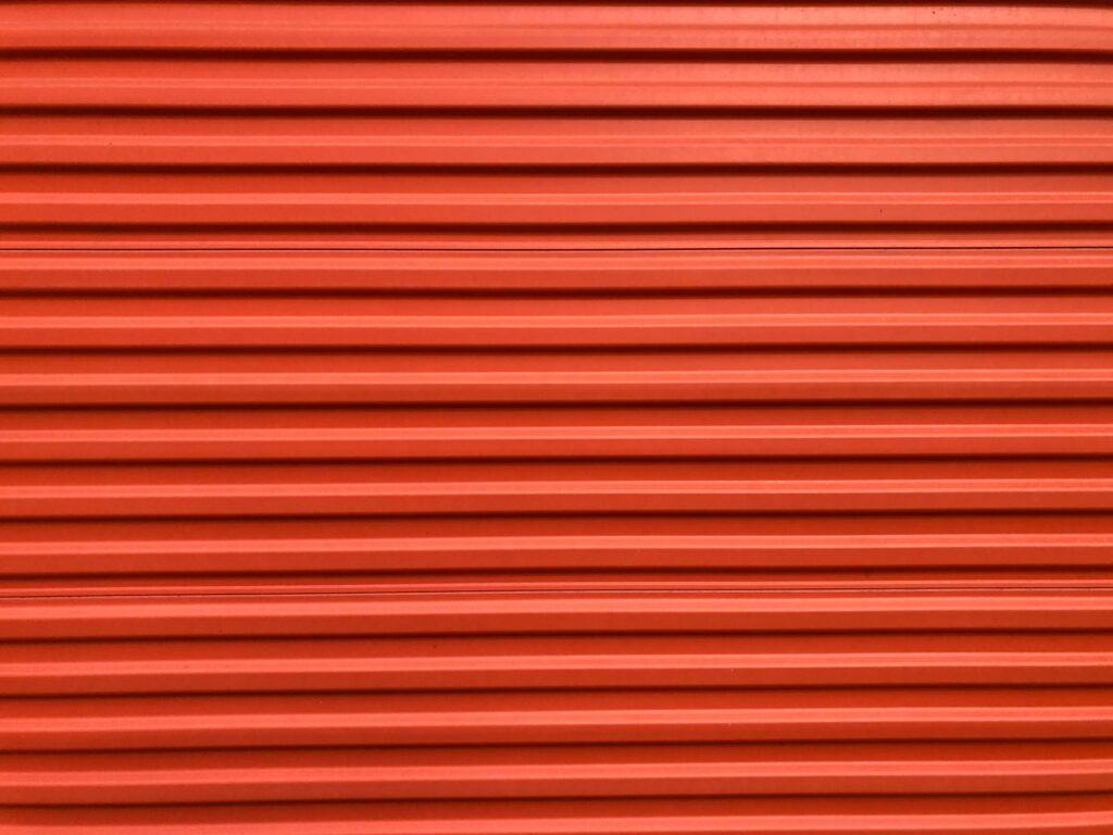 red and black striped textile the front of a storage unit