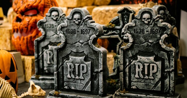a group of tombstones sitting on top of a table