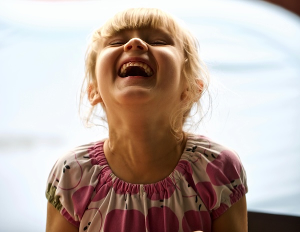 little girl laughing