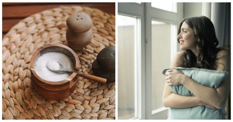 Bowl of salt and woman by window