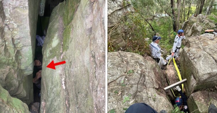 Woman being rescued from a rock crevasse