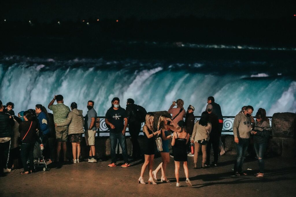 People Standing Near the Waterfalls