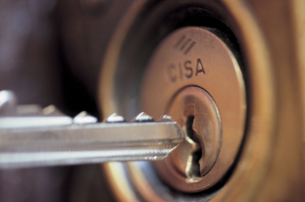 Inserting A Key In The Lock