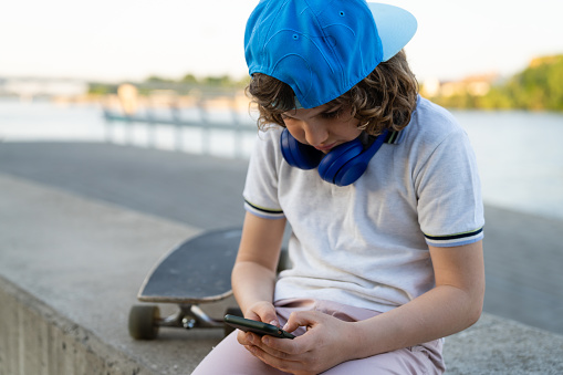 Boy distracted by his phone