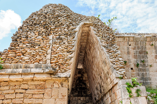 Merida, Mexico, Uxmal Archaeological Zone, false corbelled archway limestone, tourist