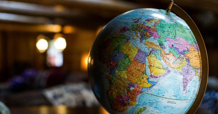 Picture of desk globe (Kyle Glenn via Unsplash)