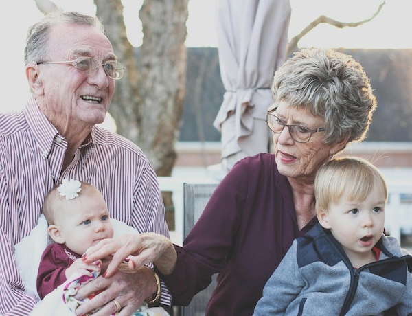grandparents with two kids