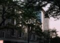 a building with a sign that says cut above it