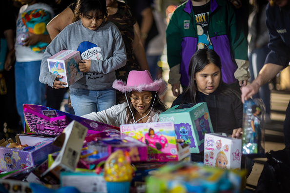 It didn't take long for the spirit of Christmas to sweep through the community and donate toys for a toy drive following a fire that destroyed the Victory Outreach Church in Pomona