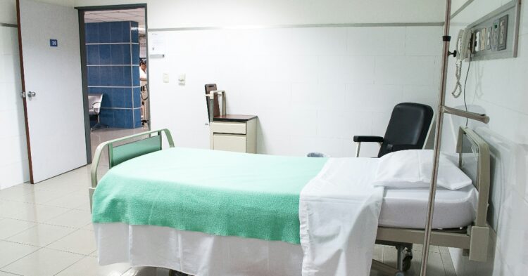 Hospital bed (Photo by Martha Dominguez de Gouveia via Unsplash)