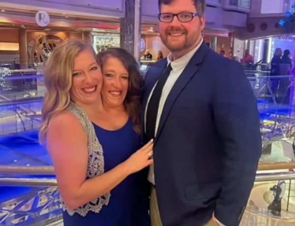 Abby and Brittany Hensel with husband