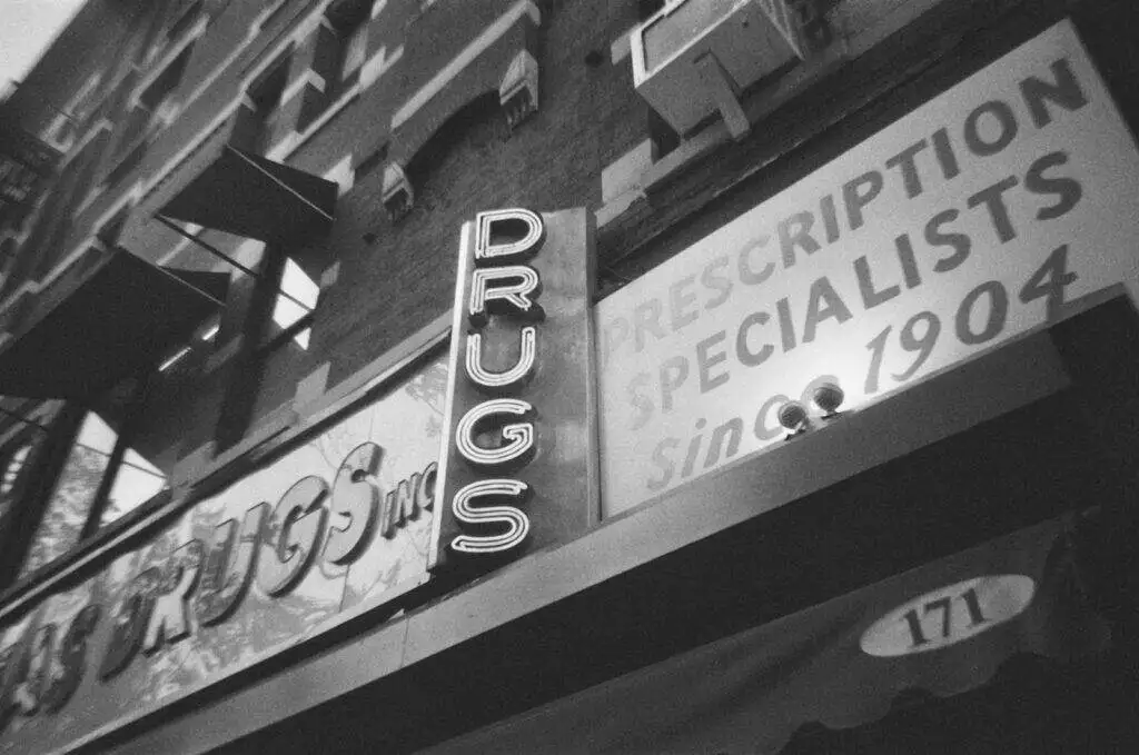 A black and white photo of a store front