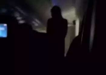 Woman standing during flight