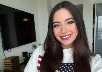 Ashley St. Claire selfie wearing American Flag sweatshirt (X | stclairashley)
