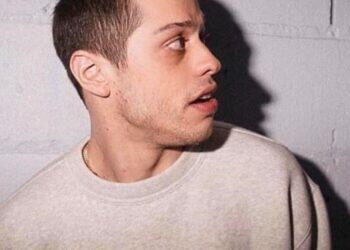 Pete Davidson looking to the side